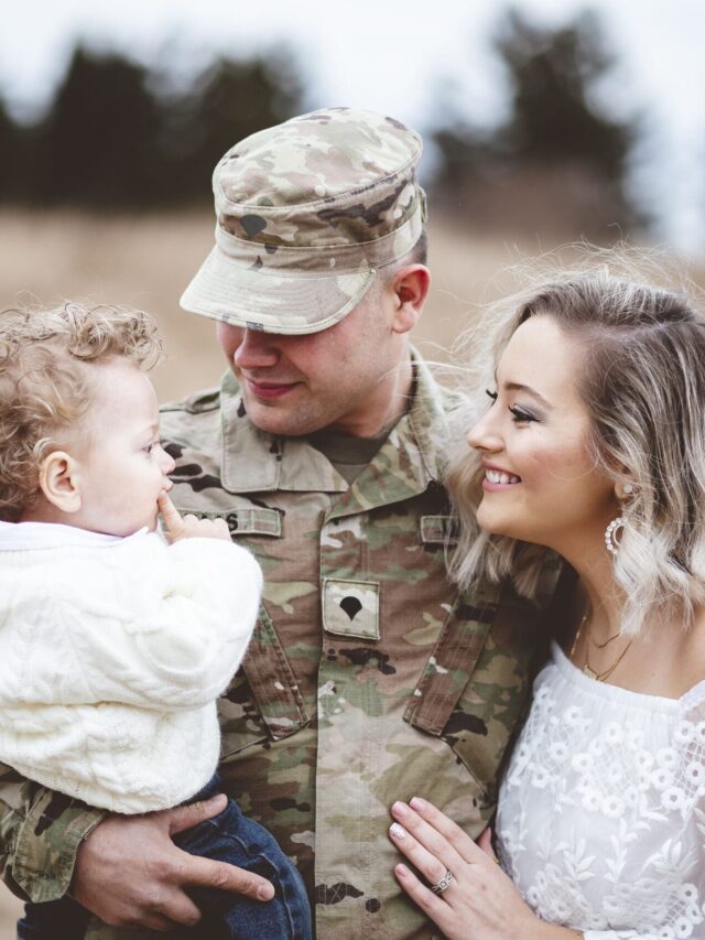 Young family portrait - a soldier father holding his son and a beautiful young wife | Ginger Varga Young family portrait - a soldier father holding his son and a beautiful young wife